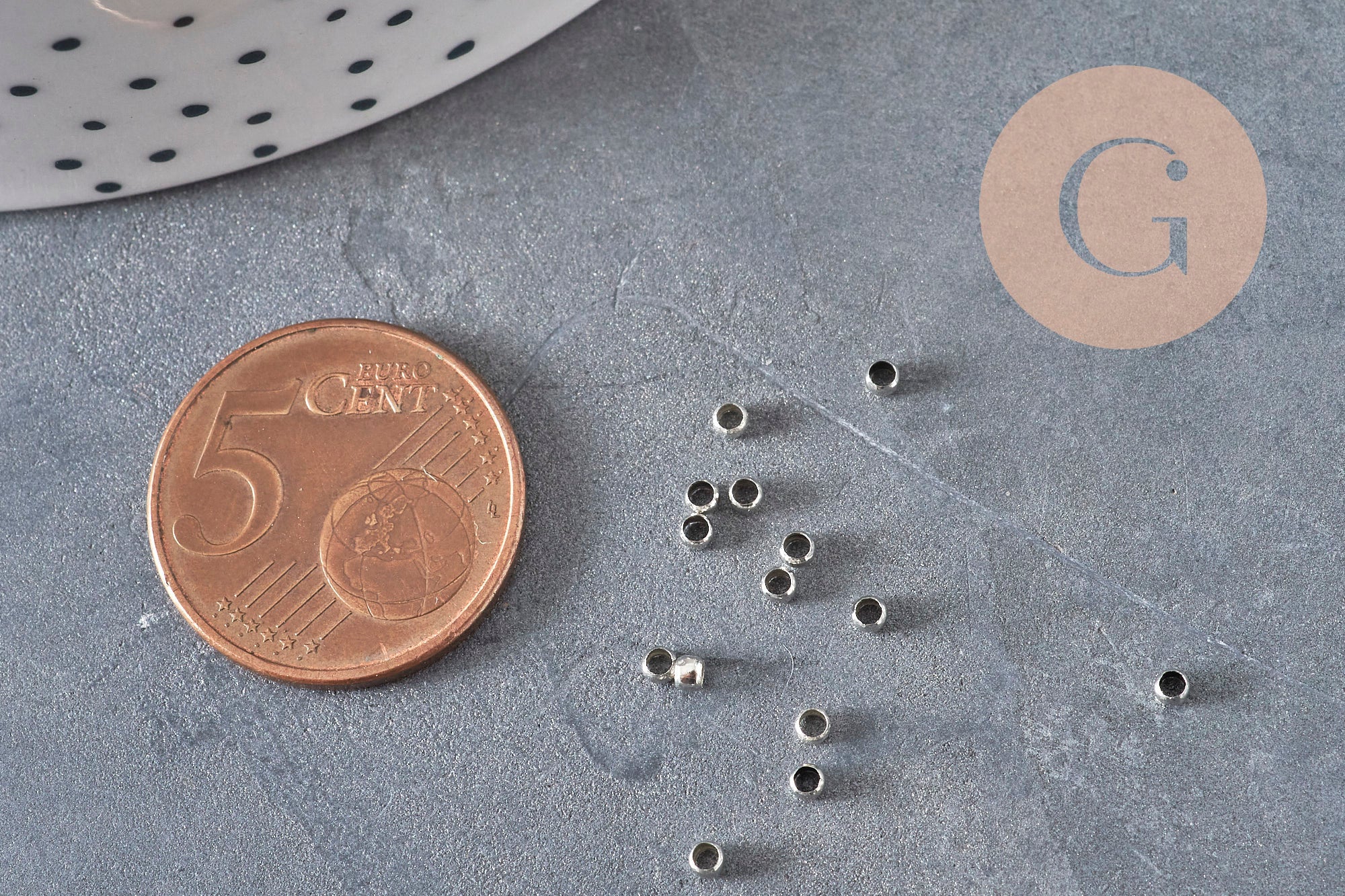 Cuentas aplastables latón platino 2x1.2mm, x1 gramo VÁLIDO
