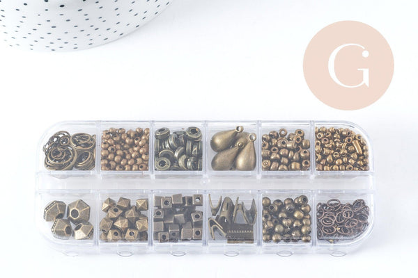 Boite Kit mix de 12 types de fournitures et perles zamac laiton Bronze, x1 (G8845)