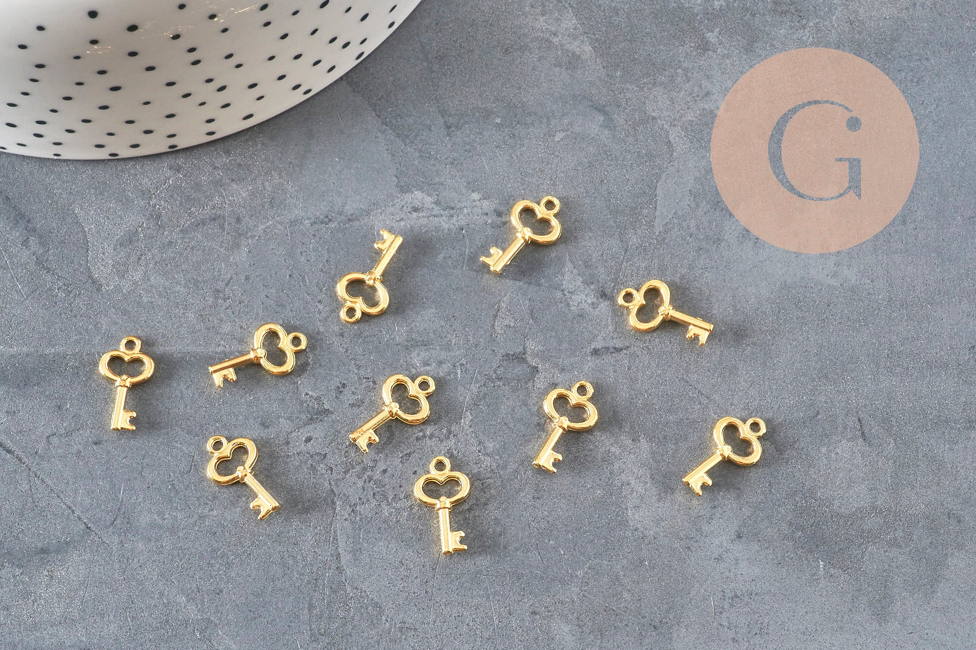 Colgante llave zamak dorado 15.5mm, x10 (G11227)