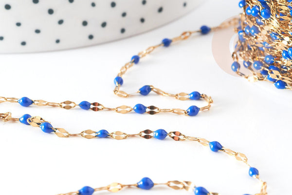 Chaine acier inoxydable 304 doré IP 14k fantaisie résine bleue 2mm, x1 mètre (G0942)