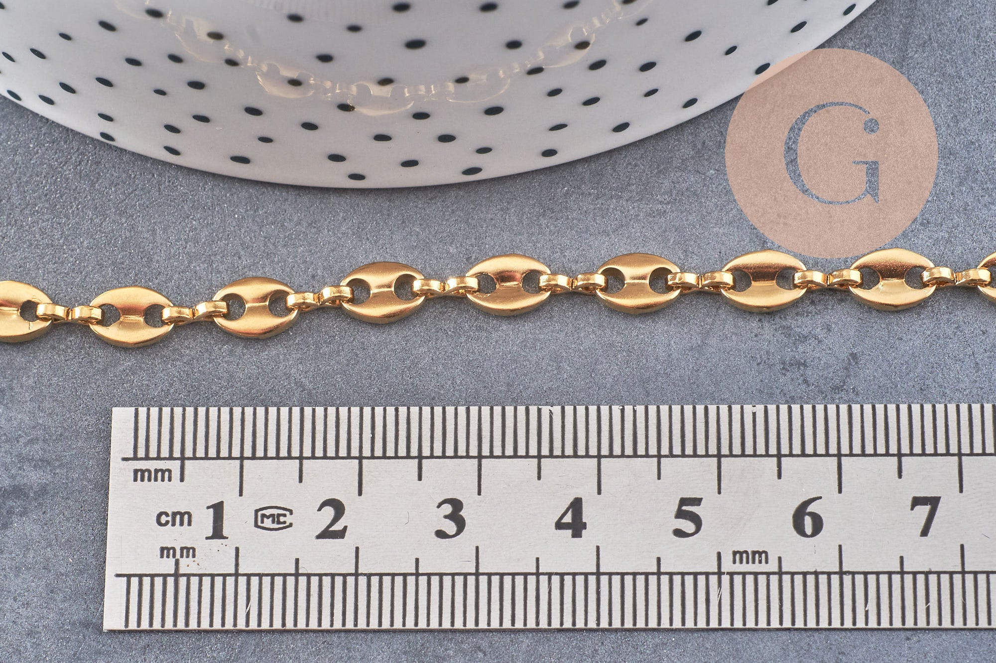 Chaine acier inoxydable doré IP 18k maille grain de café 7x4mm, x1 mètre (G5499)