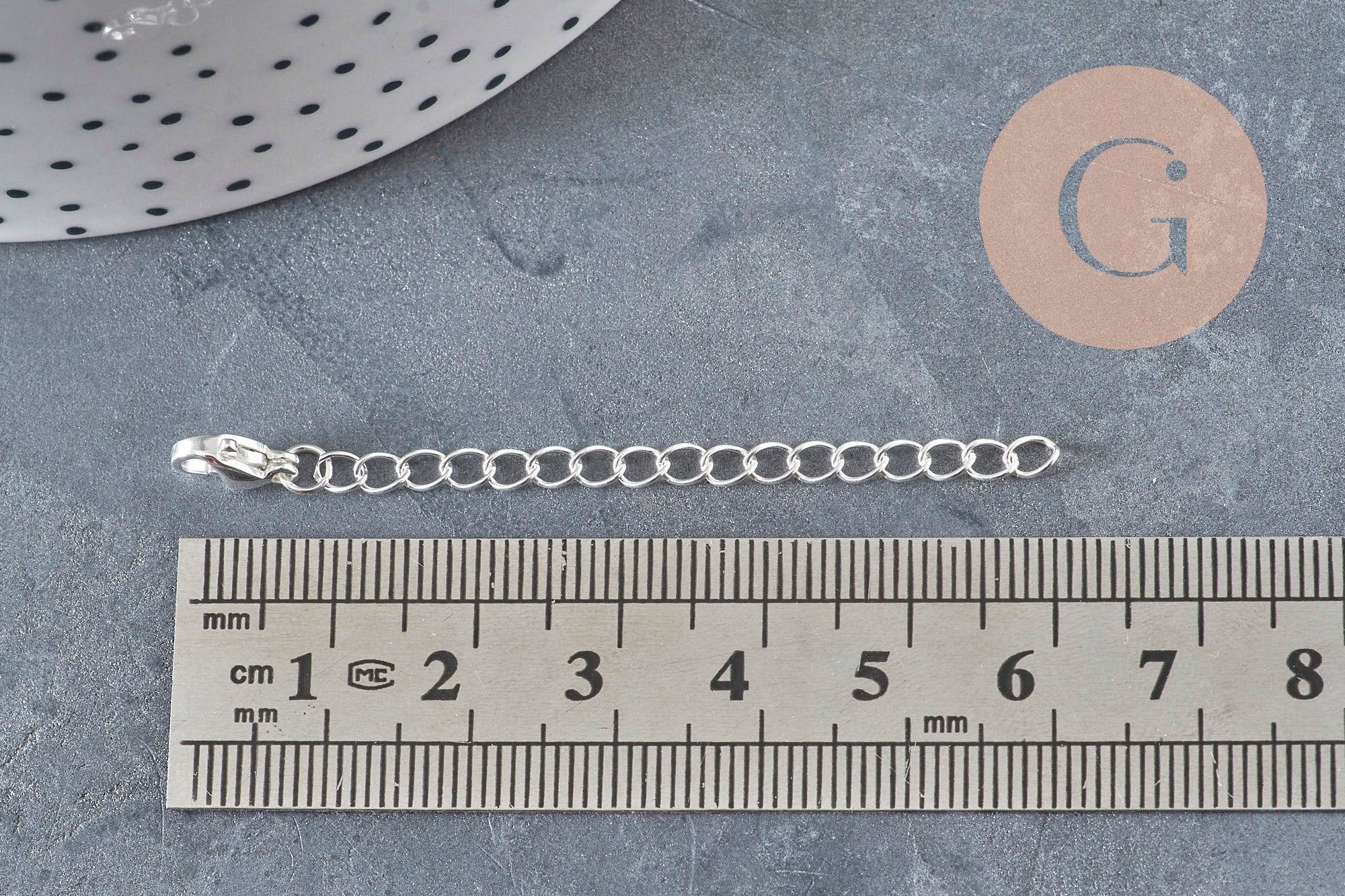 Cadena de extensión con cierre de acero inoxidable plateado de 62 mm, x1 (G11190)
