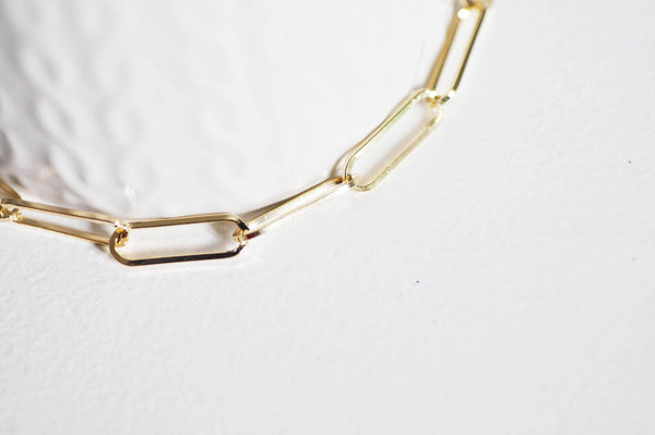 Chaine fer doré or pâle maille rectangle 18x6mm, x1 mètre (G1858)