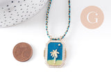 Collier médaille émaillée palmier bleu turquoise zircons cordon tressé zamac doré 45cm x1 (G10364-5)