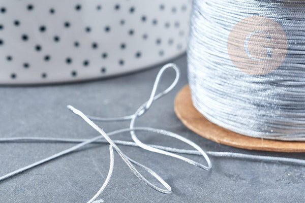 Cordon argenté tressé polyester 0.6mm, cordon fil de jade pour bijoux, x1 mètre G8449