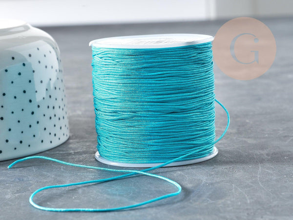 Cordon bleu turquoise tressé polyester 0.8mm, x1 mètre (G3796)