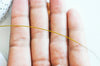 EP Fil nylon 2m métallique acier doré 0,6mm G3791