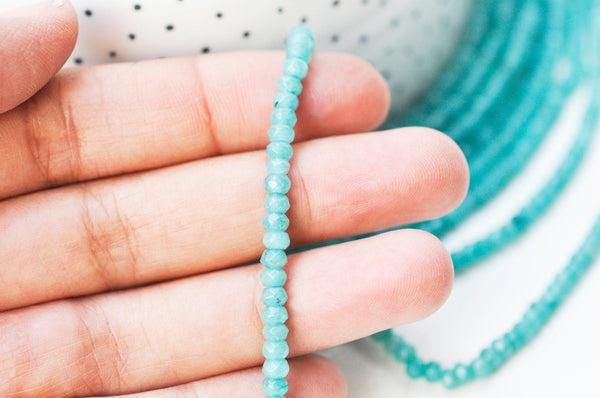EP Perle abacus jade teinté bleu turquoise 4x2mm,fil de 38,35 cm G4710