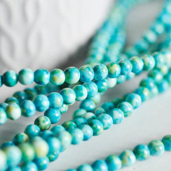 EP Perle jade océan naturel bleue 4mm, x1 fil (G1644)