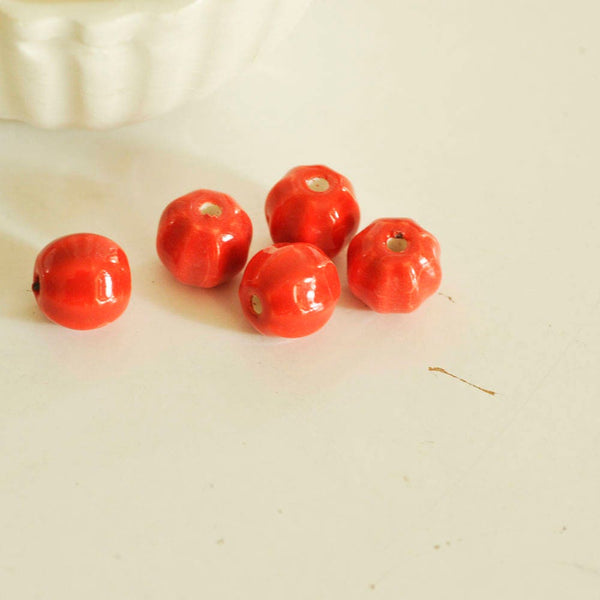 EP Perle porcelaine rouge 13mm striées x5 G0703