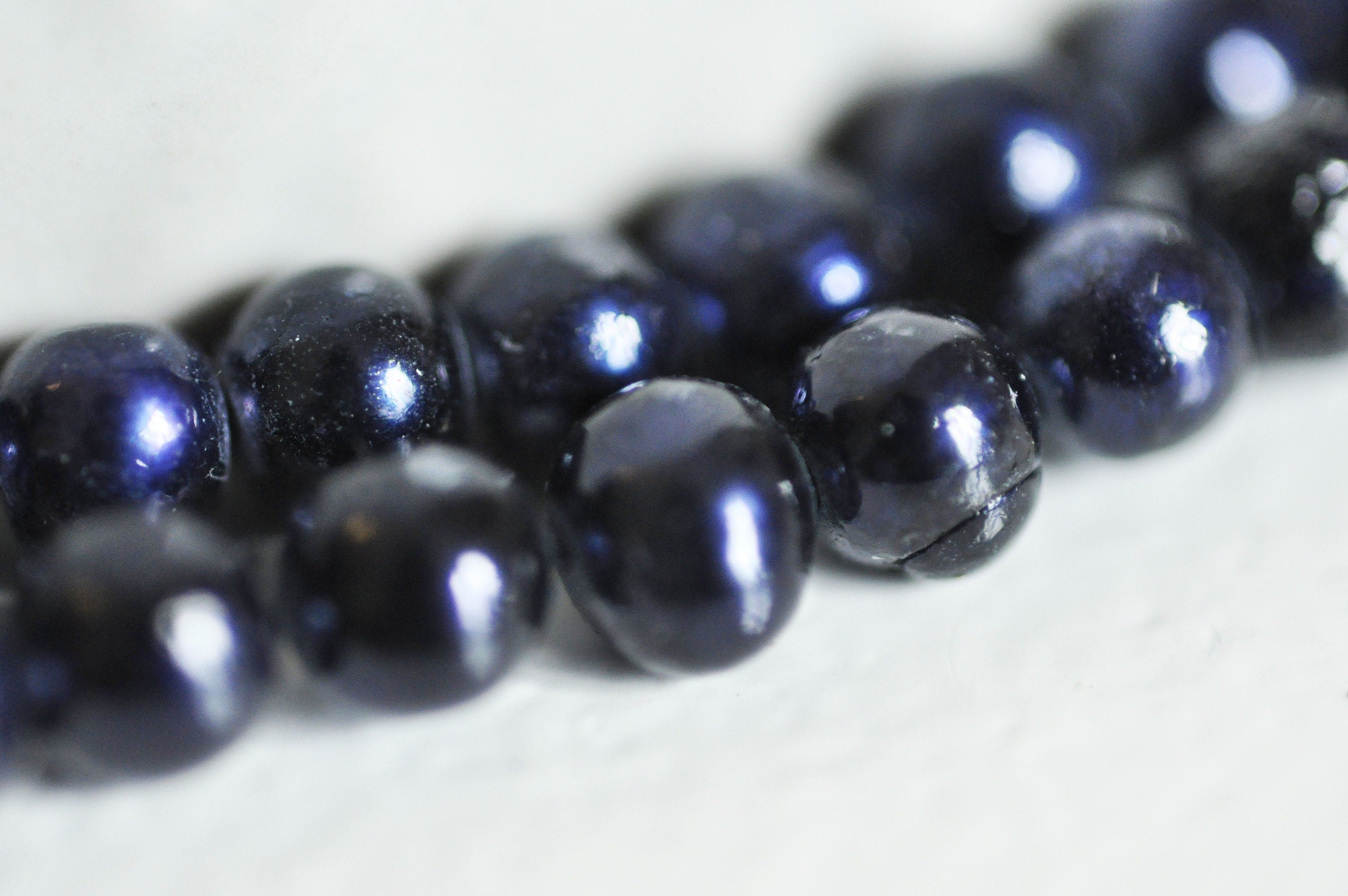 EP -perle eau douce naturelle noire 4mm,le fil de 38 cm, x1 G1256