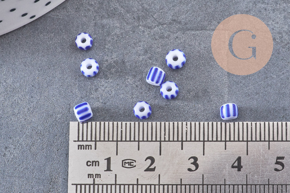 Grosse Perle rocaille rayé bleu blanc 3-4.5mm, x10gr (G9280)