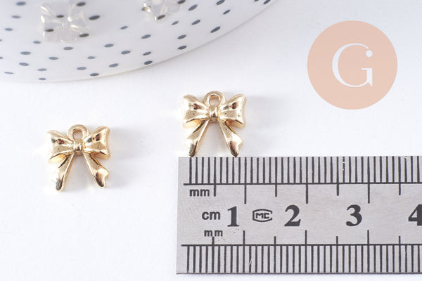 Pendentif noeud papillon zamac doré 11mm, x2 (G10651)
