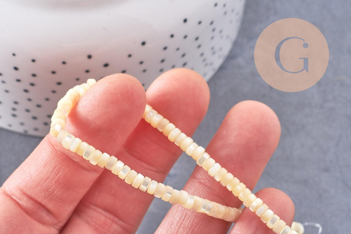 Perle heishi nacre naturelle jaune pastel, perle tube coquillage coloré,2x4mm, fil de 20cm, x1 (G4476)