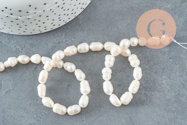 Perle naturelle blanche ovale eau douce 8.5-12mm, perle de culture percée ,fil de 35cm, x1 G9581