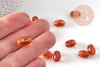Perle ovale acrylique imitation ambre marron 14mm, x10 (G10998)