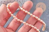 Perle ovale naturelle couleur pêche, perle de culture d'eau douce percée,4-5mm, fil de 36cm, x1 (G2557)