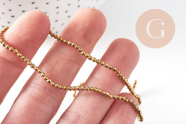 Perle ronde facetté hématite dorée 2mm, x1 fil 39.8cm (G4428)