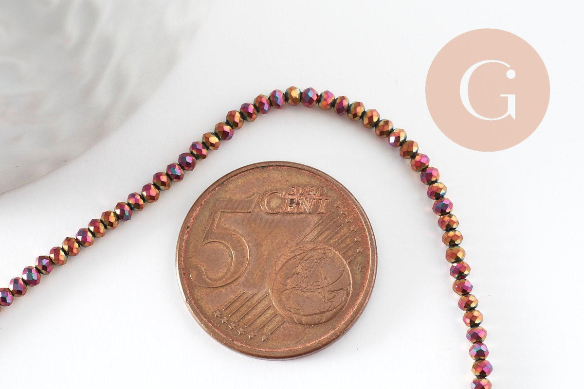 Perle ronde verre facettée multicolore pourpre irisée 2mm, x1 fil de 35cm (G7456)