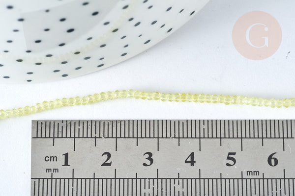 Perle ronde verre facettée transparente jaune clair, 2~2,5mm, fil de 37cm, x1 (G7335)