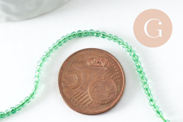 Perle ronde verre facettée transparente vert clair 2mm, DIY, fil de 37cm, x1 (G7445)