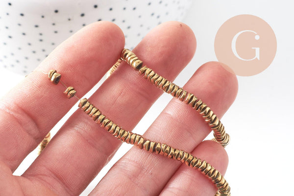 Perle rondelle hématite dorée 18K forme vague 4mm, fil de 40.5cm x1 (G5657)