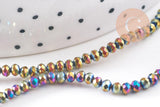 Perles abacus cristal à facette noir irisé 3x2mm, x1 fil de 32cm (G4692)
