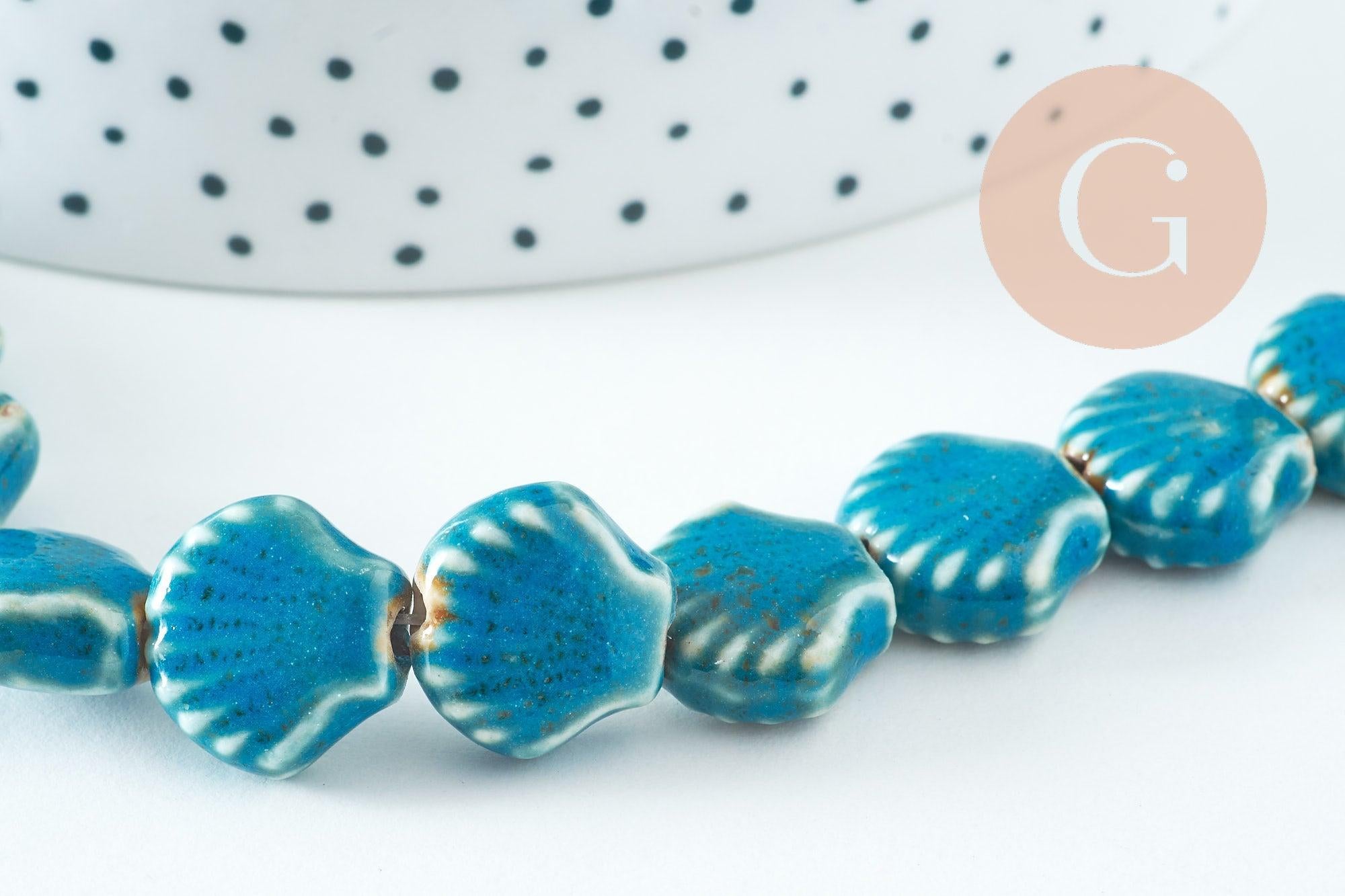 Perles coquillage porcelaine vert bleu 13.5mm, x1 fil de 30cm (G10733)