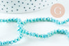 Perles cristal ronde facetté turquoise irisé 4mm, x1 fil de 32cm (G10725)