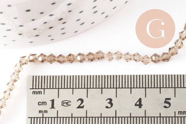 Perles cristal toupies facette beige transparent 3mm,fil de 36cm, x1 (G2598)