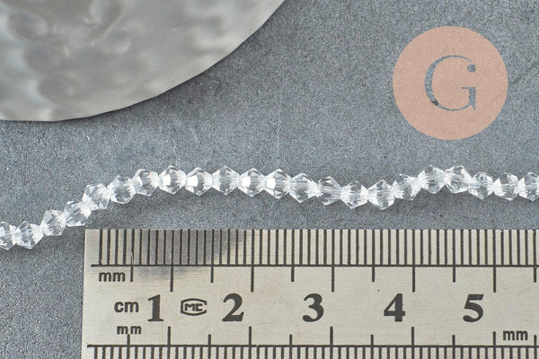 Perles cristal toupies facette transparent 3mm, x1 fil de 45 cm (G1632)
