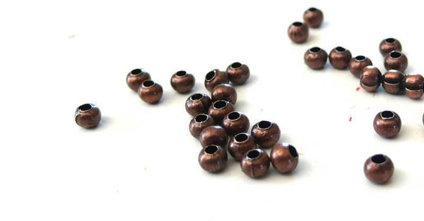 Perles intercalaires fer cuivre 3mm, x10 gr (G1264)