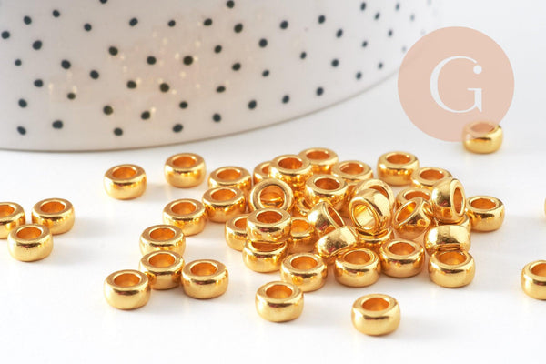 Perles intercalaires rondelles zamac doré 7mm, x50 (G10938)