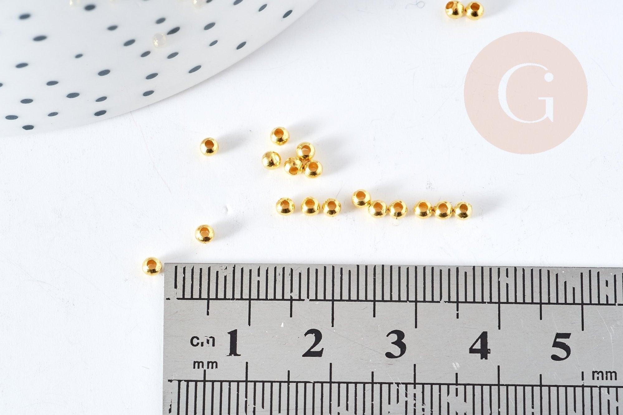 Perles intercalaires rondes laiton doré 2.4mm, x 1Gr (G9841)