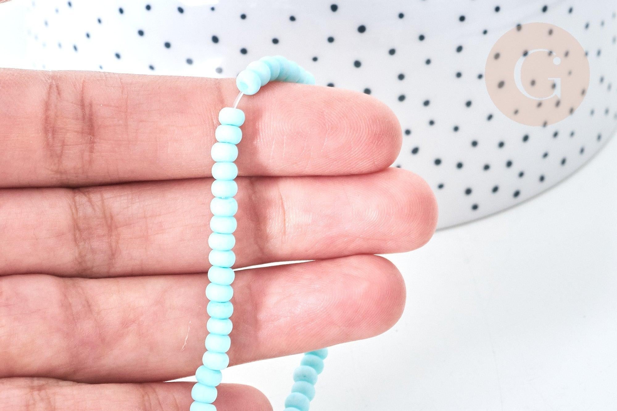Perles porcelaine abacus bleu turquoise 4x3mm, fil de 38cm, x1 (G7812)