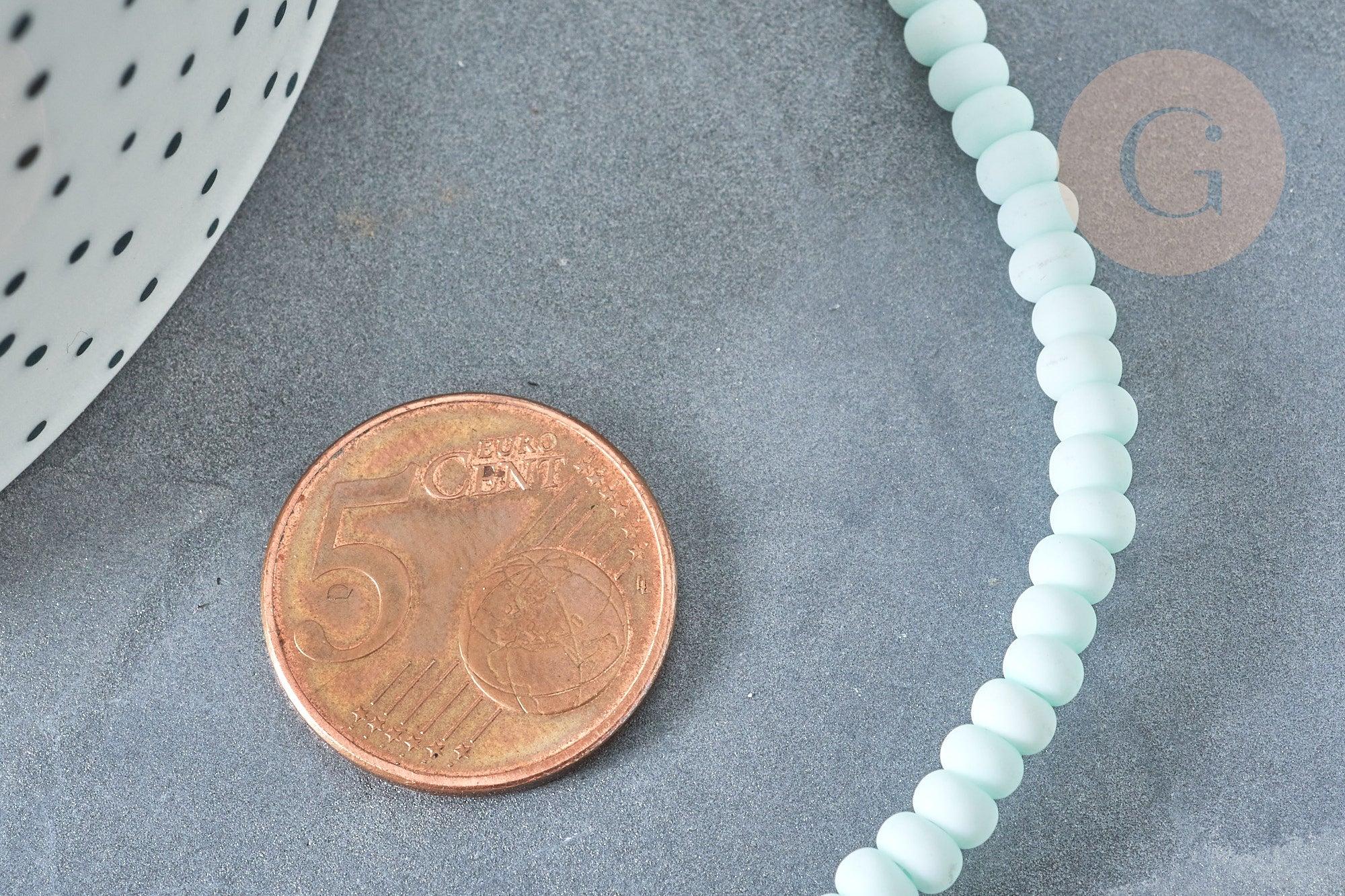 Perles porcelaine abacus vert pâle 4x3mm, fil de 38cm, x1 (G7810)