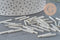 Cuentas de semillas Tubo de vidrio plateado metálico 20 mm x 2,5 mm, tubo largo, cuenta plateada, x 10 gr G1163