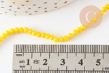 Perles rondelle verre jaune facette 3mm, x1 fil de 29cm (G2669)