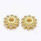Perles rondelles fleurs zamac doré 6.5mm, x50 (G4978)