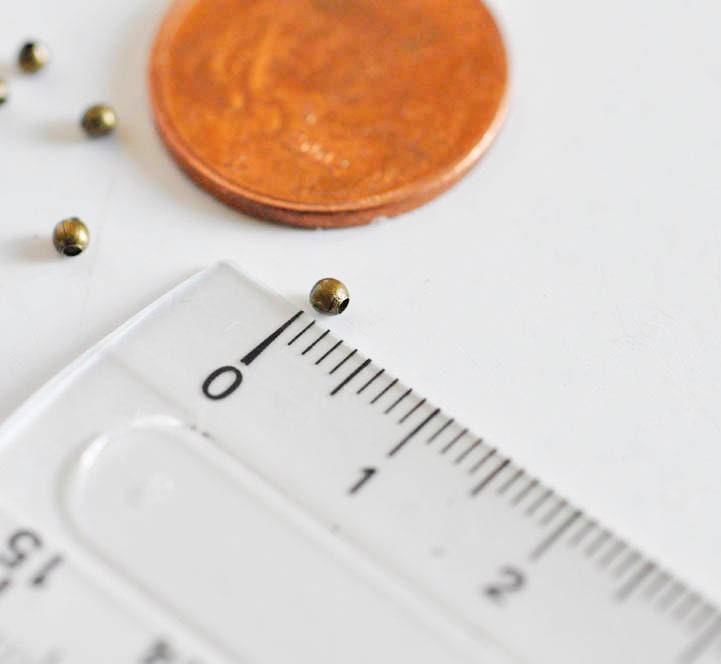 Perles rondes bronze intercalaires 2mm, x10 gr (G5147)