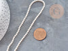 Perles rondes coquillage naturel blanche nacrées 4mm, x1 fil de 40cm (G9033)