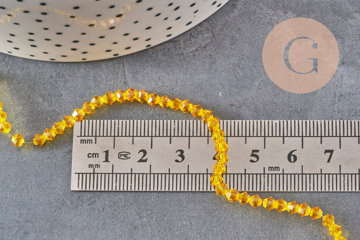 Perles toupies cristal à facette jaune 3.8x3mm, x1 fil de 32.5cm (G11343)-Perles-Gingerlily Perles