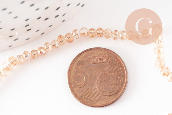 Perles toupies cristal orange transparent irisé 3.5x2.5mm, fil 25cm, x1 (G8595)