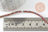 Perles toupies cristal rouge irisé métallisé 3x2mm, perles création bijoux, fil de 33cm x1 (G8106)