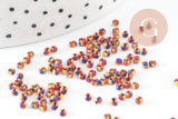 Petite Perle rocaille rayé multicolore 1.5x2mm x 10gr (G9491)
