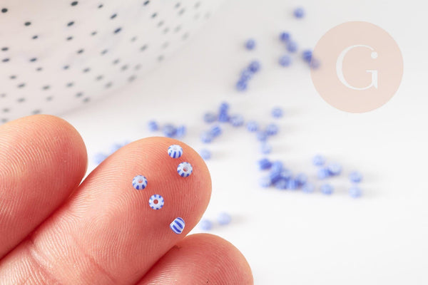 Petite perle rocaille rayé bleu blanc 1.5x2mm, x10 Gr (G9286)