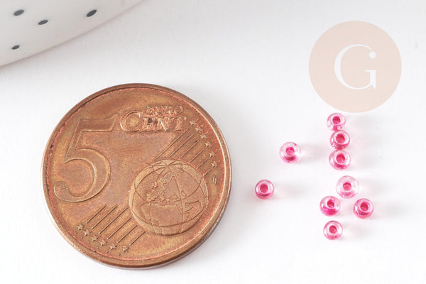 Petite perles de rocaille rose transparent 2.5mm, x 10gr (G2371)