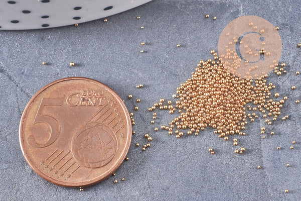 Sable verre doré 0.6mm non percé, x10gr (G1463)