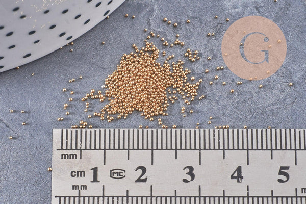 Sable verre doré 0.6mm non percé, x10gr (G1463)