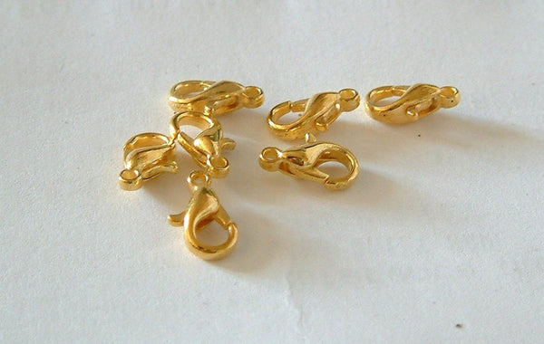 fermoirs mousquetons zamac doré 12mm, x 50 (G0024)